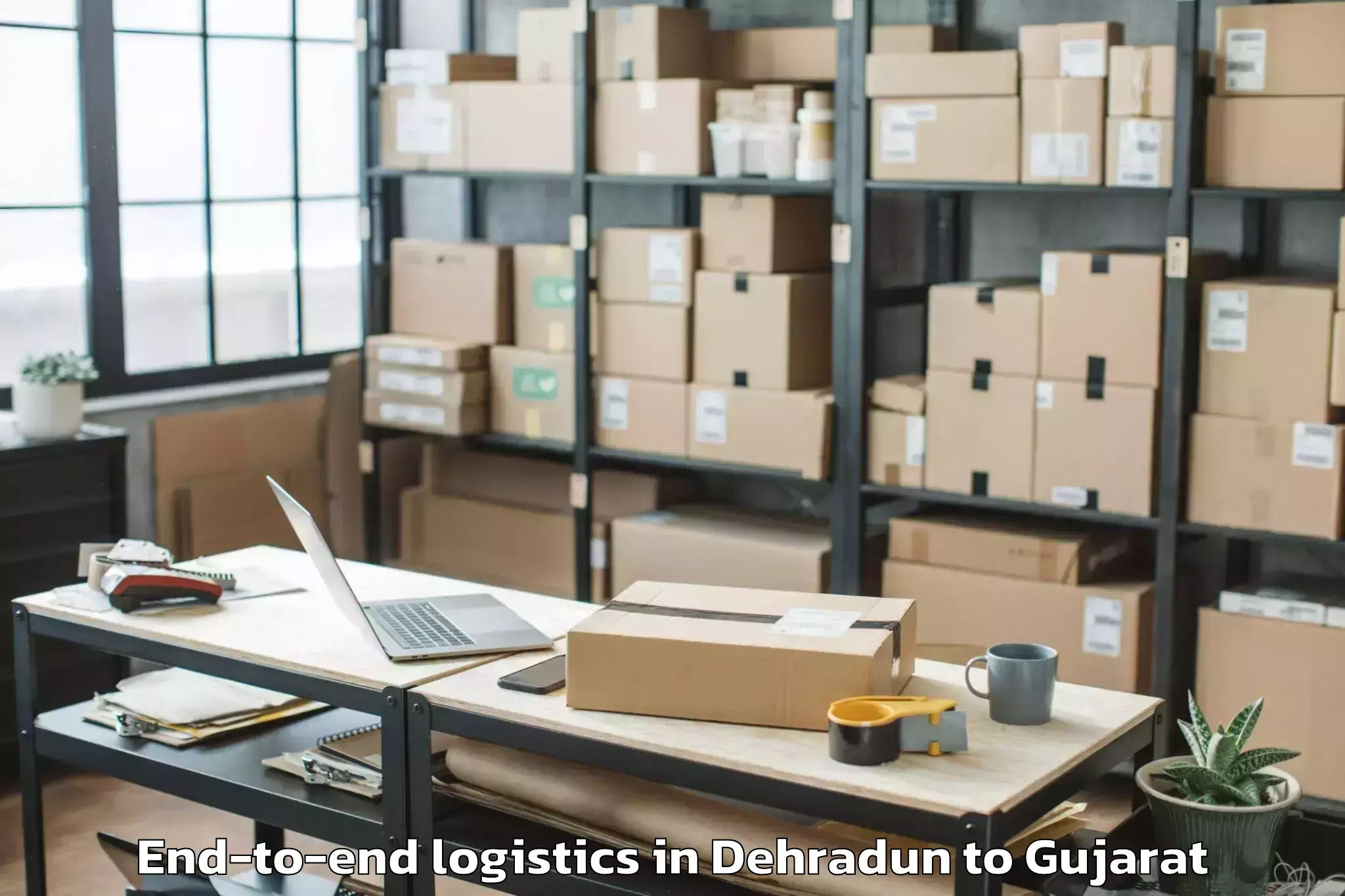 Professional Dehradun to Tharad End To End Logistics